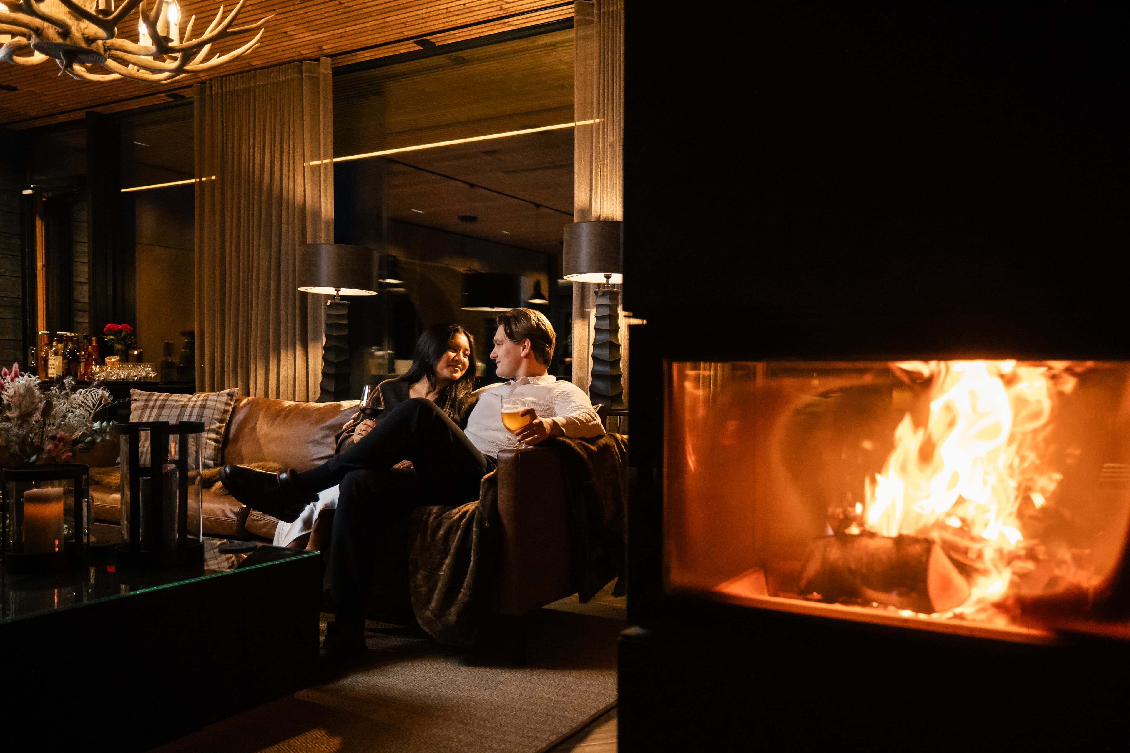 Sitting by the fireplace at the Lounge